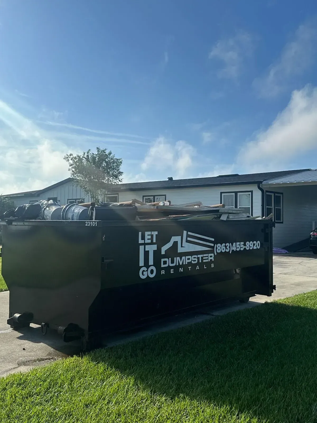 Black dumpster with 