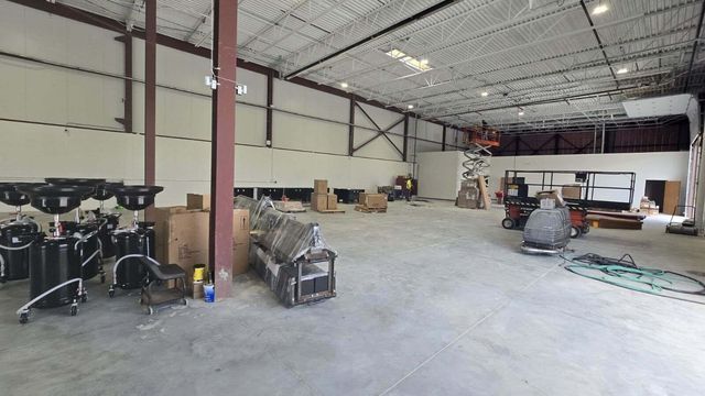 Wide View Of Auto Repair Shop Interior With Equipment Layout | Auto DR