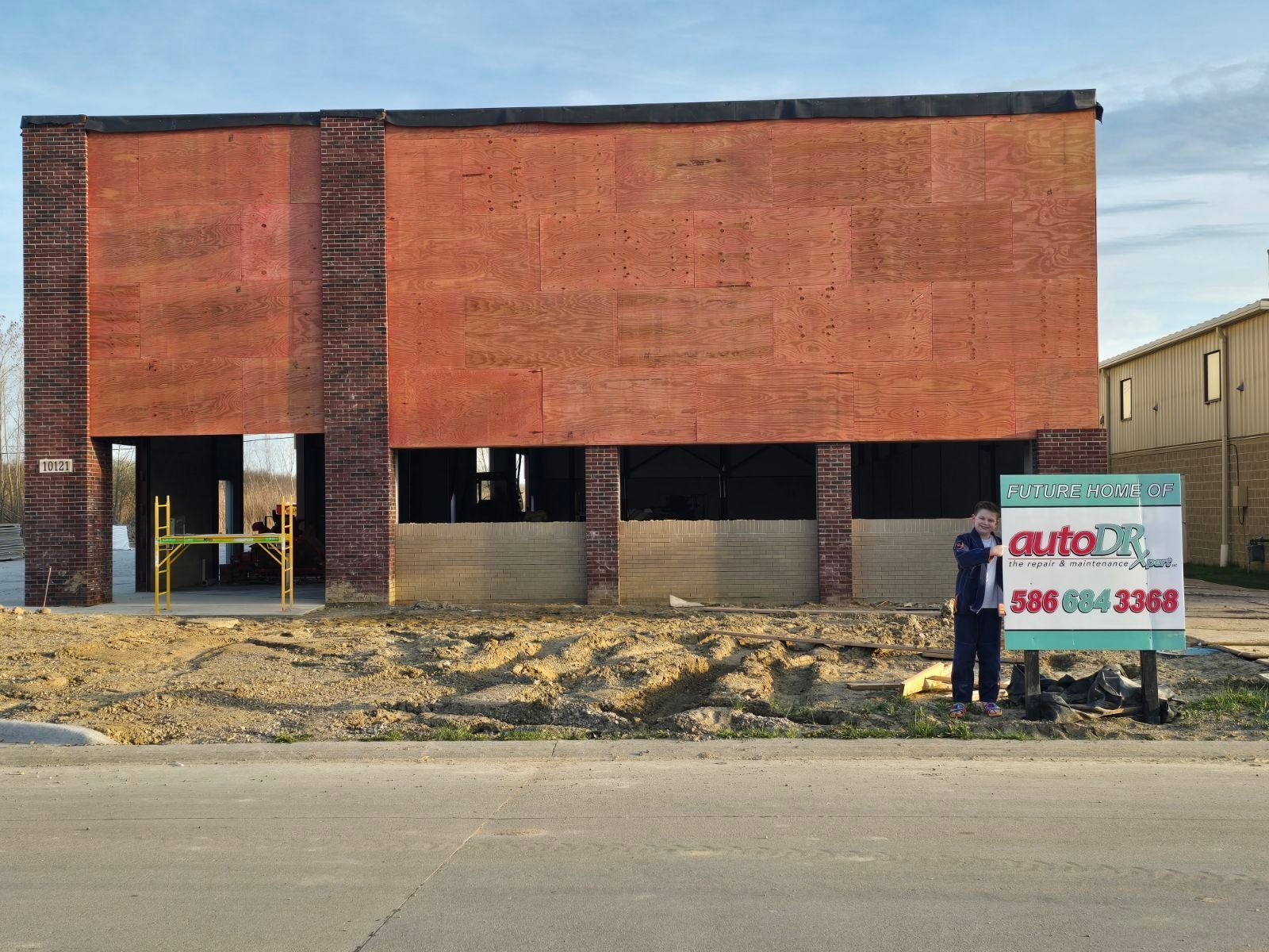 Auto Repair Building Exterior With Auto DR Branding Sign | Auto DR