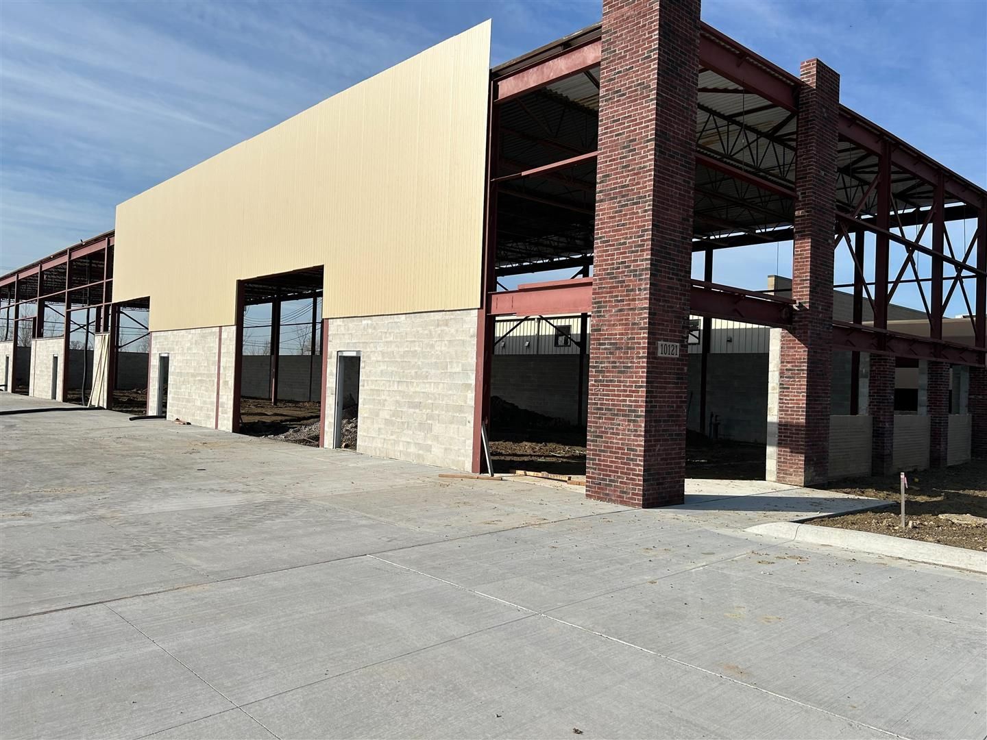 Auto Repair Shop Exterior With Service Bay Openings | Auto DR