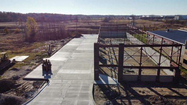 Concrete Driveway And Steel Framing At Auto Repair Site | Auto DR