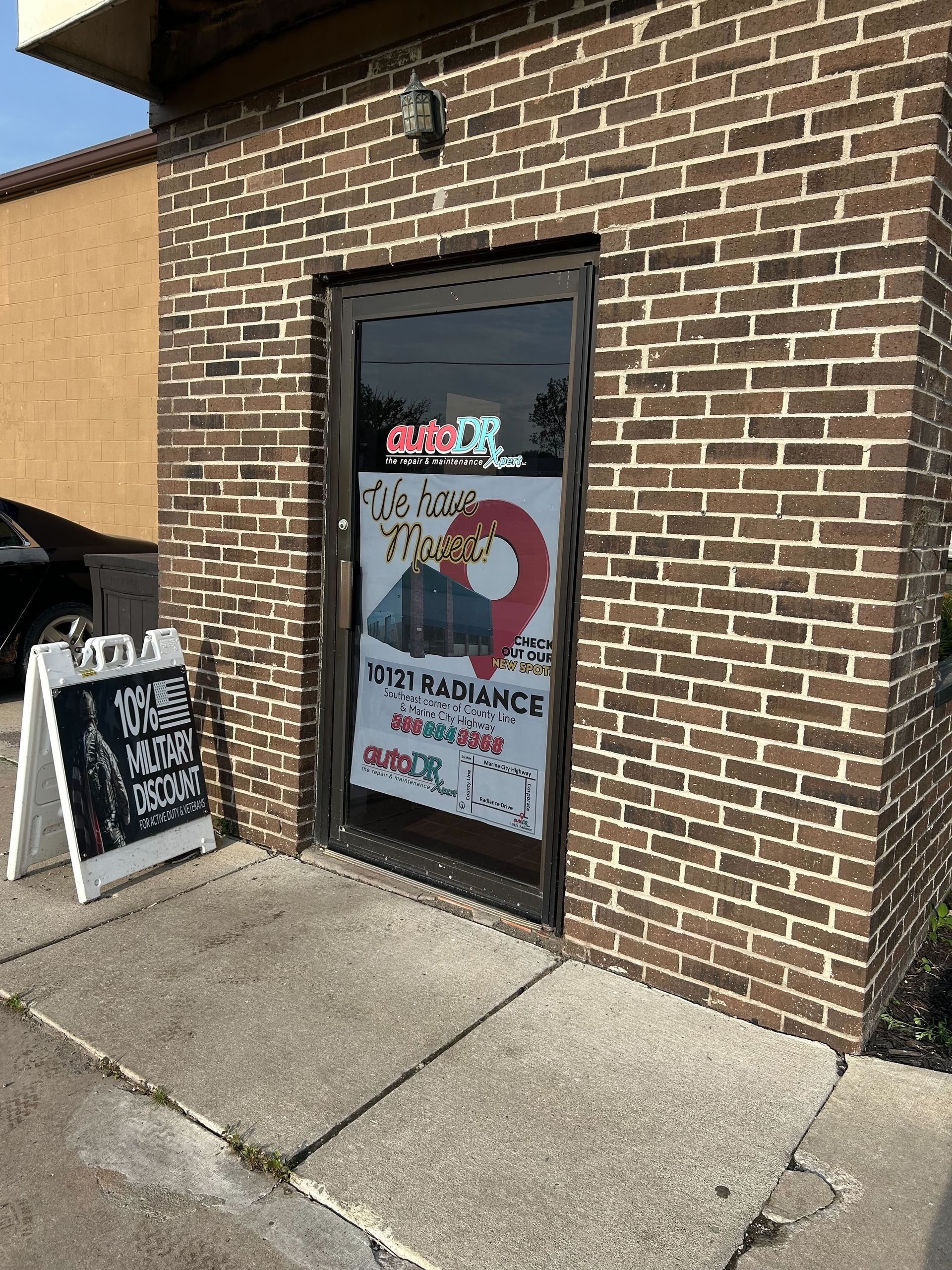 Auto Repair Shop Entry Door With Auto DR Logo Signage | Auto DR