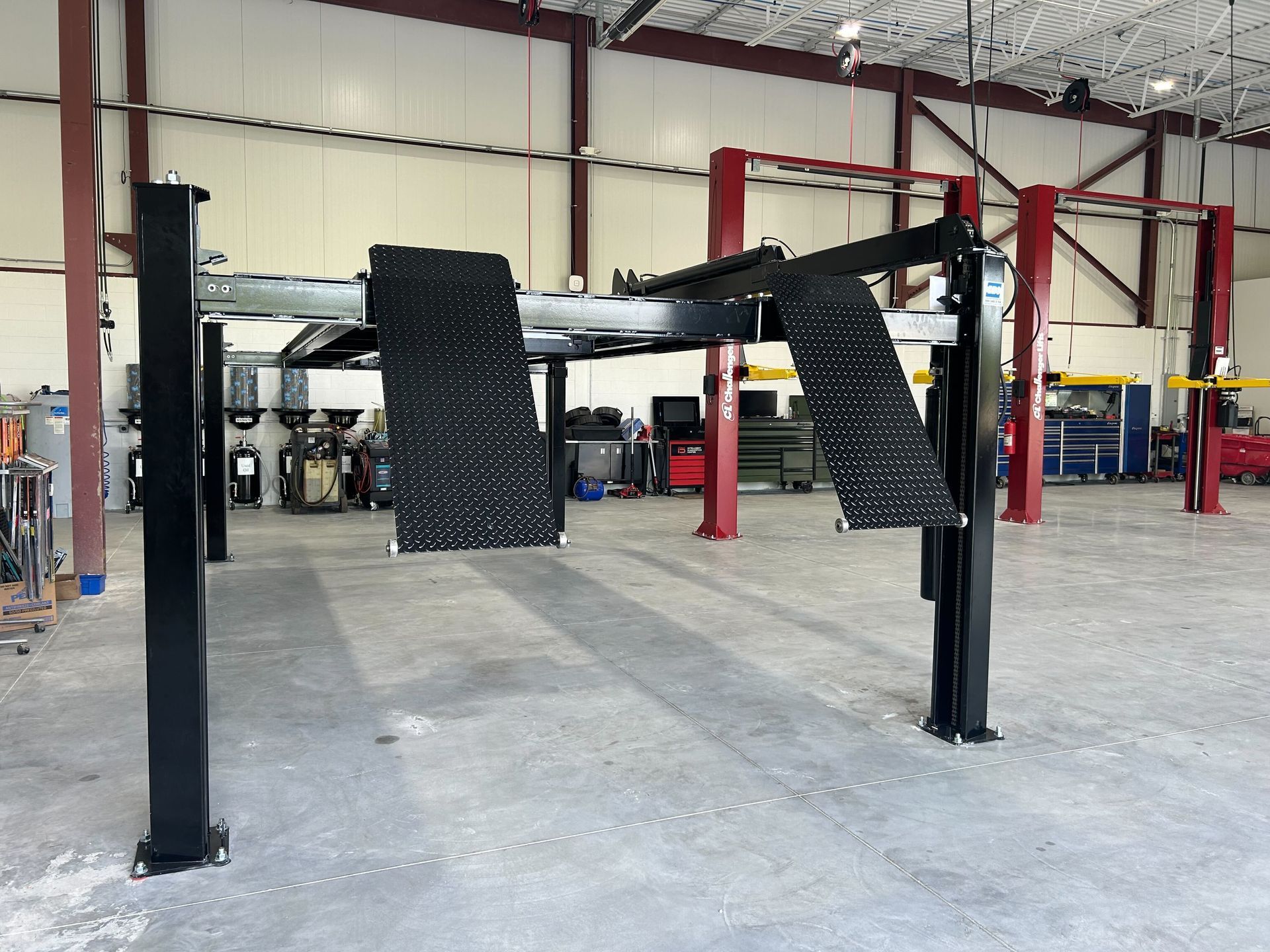 Two Post Vehicle Lifts Installed Inside Auto Repair Facility | Auto DR