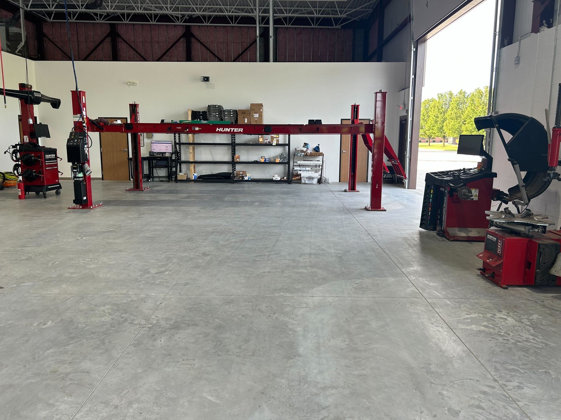 Wide Auto Repair Shop Interior With Open Service Bays | Auto DR