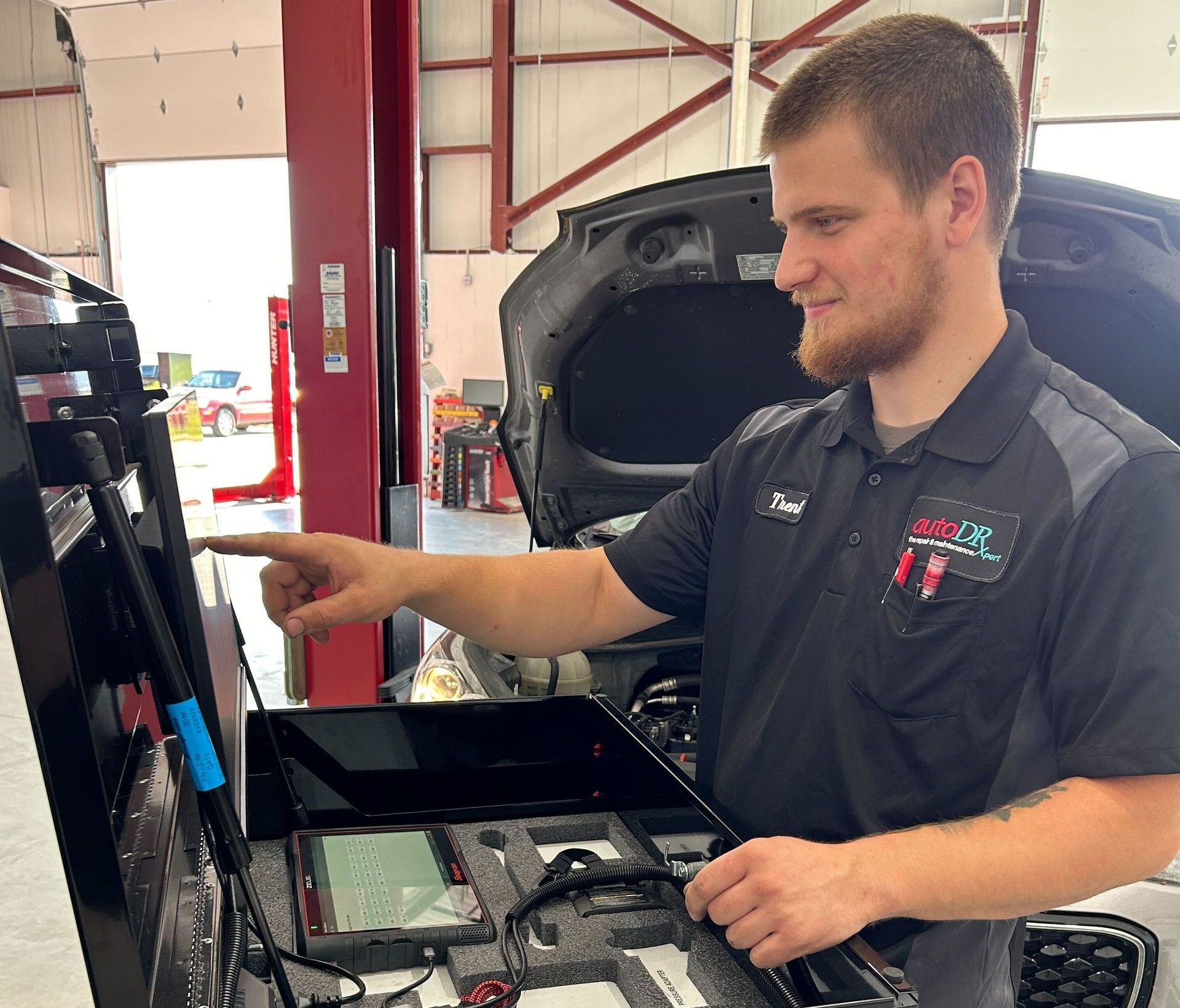 ASE Certified Mechanic Working On A Customer's Car Who Is From Fair Haven.