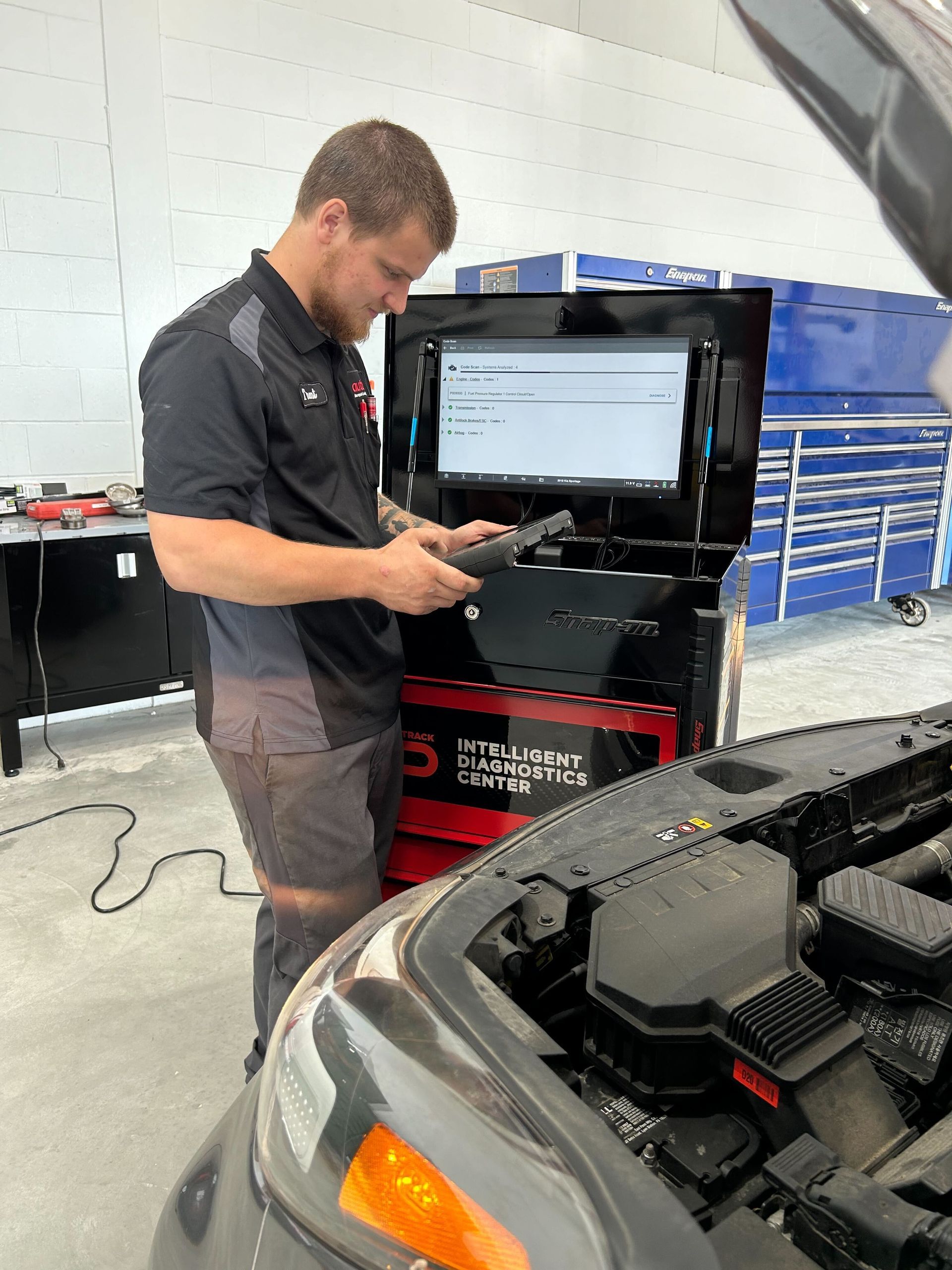 Automotive Diagnostic Testing Performed Under Hood | Auto DR
