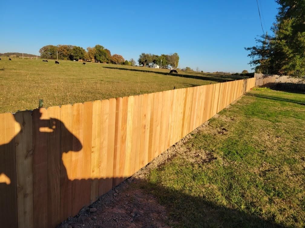 Completed wood fence installation for an Ozark, Missouri property