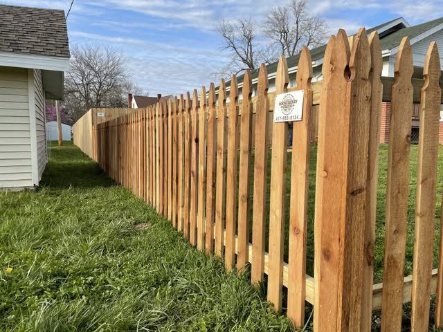 Wood privacy fence installed for a residential property near Nixa Missouri