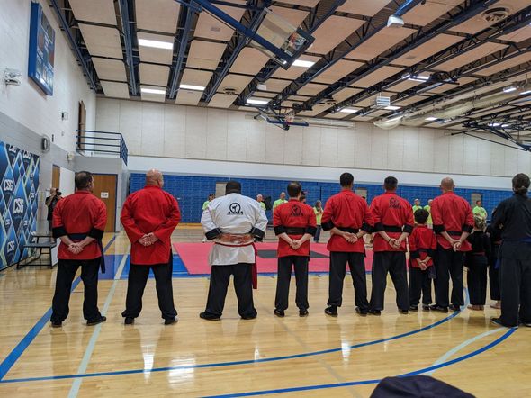Adults training with pads