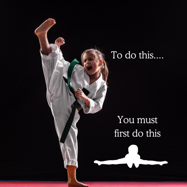 Student stretching on training mats