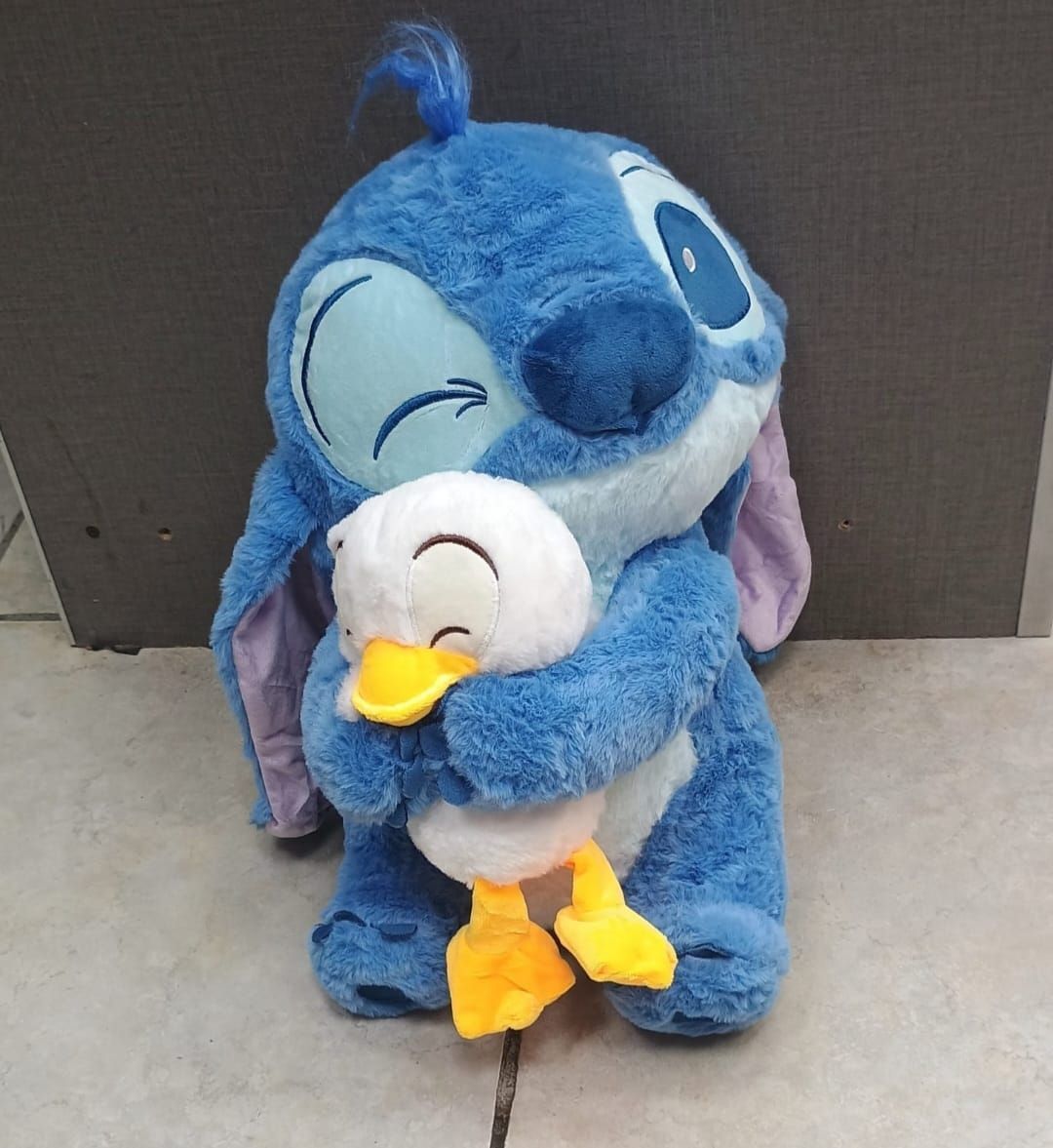 Peluche Stich con patito 45 cm