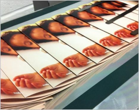 A row of cards with a woman 's face on them