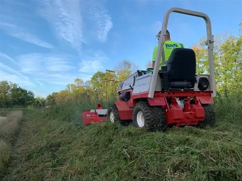R&S Property Services landscaper doing routine mowing, landscape design west chester, commercial landscape chester county, landscaping for communities to improve irrigation