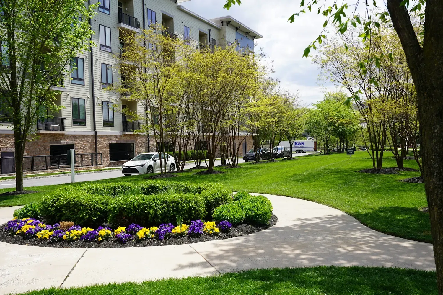 Walkway and flower bed in a front yard in Chester County, landscape design, landscaping, quality walkway and landscape completed by our professional landscapers