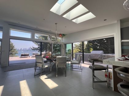 Kitchen with large doors and view of water