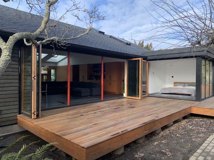 Large bifold door systems and deck of house