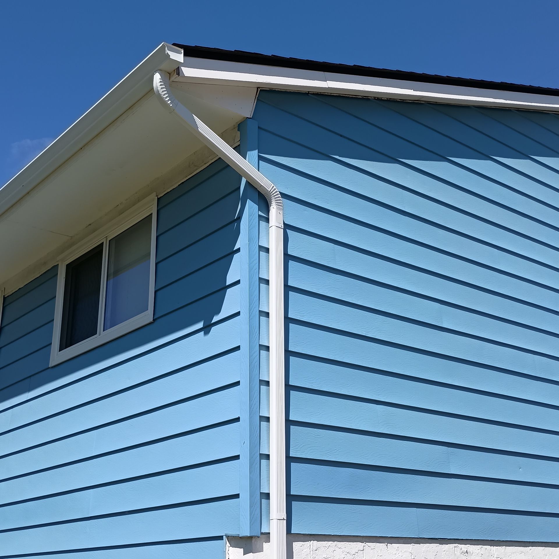 New gutters on a Schumacher Place townhouse