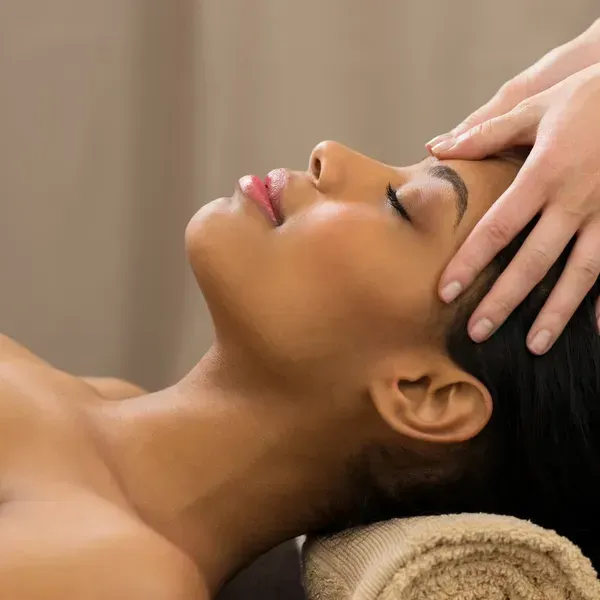 A Woman Is Getting A Head Massage — Phoenix Mandorla In Rockhampton City, QLD