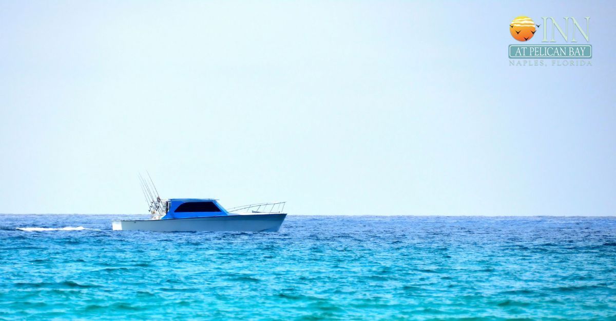 Fishing boat on the Gulf A boat is floating on top of a large body of water.