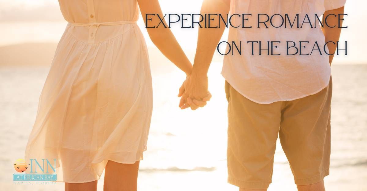 A man and a woman are holding hands on the beach