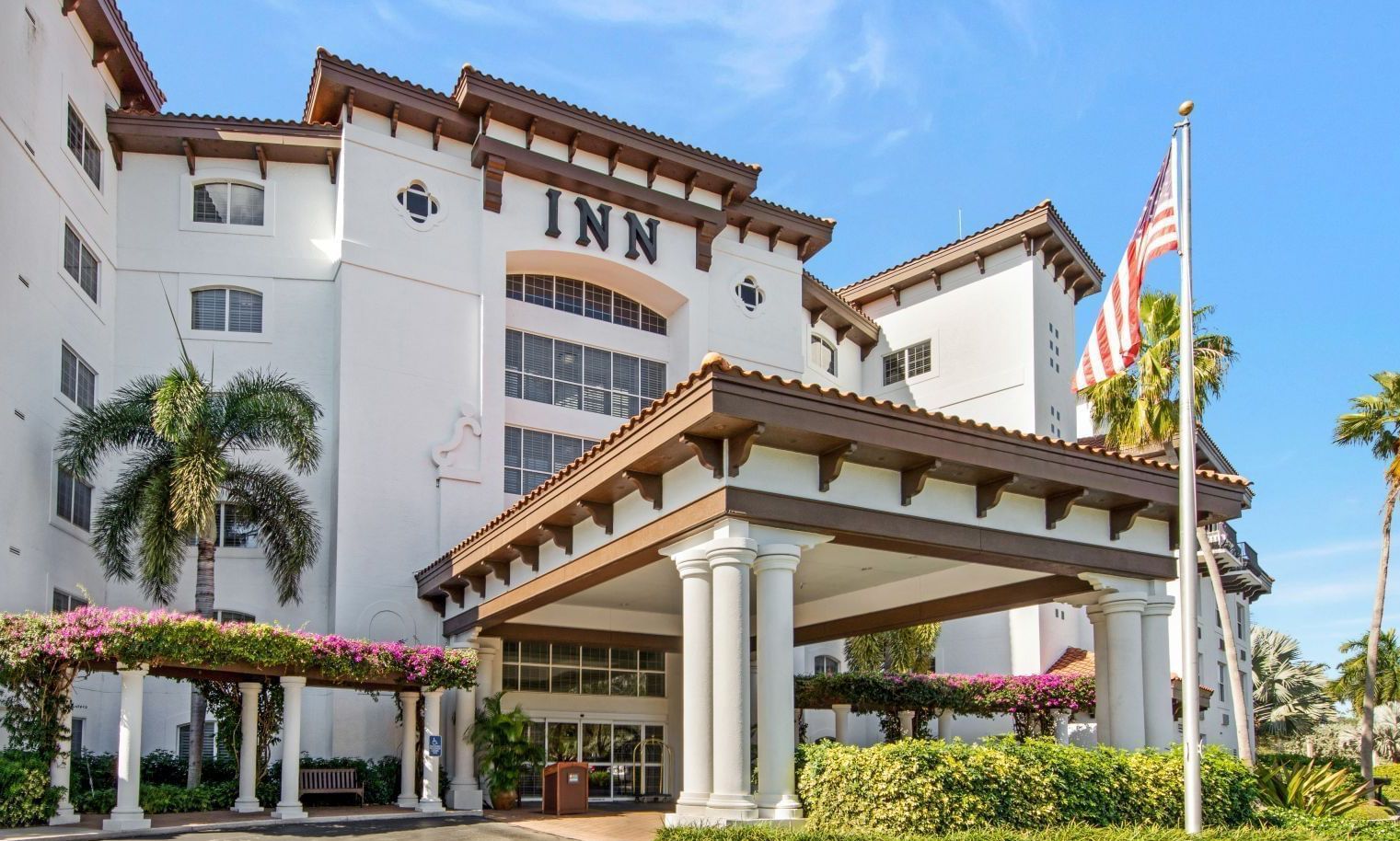 Front view of the Inn at Pelican Bay, a boutique hotel.