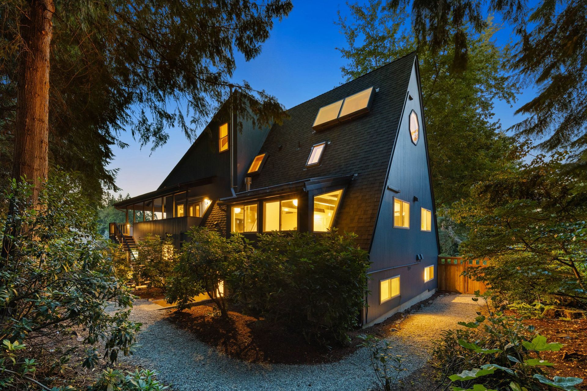 Exterior at Dusk after full home remodeling