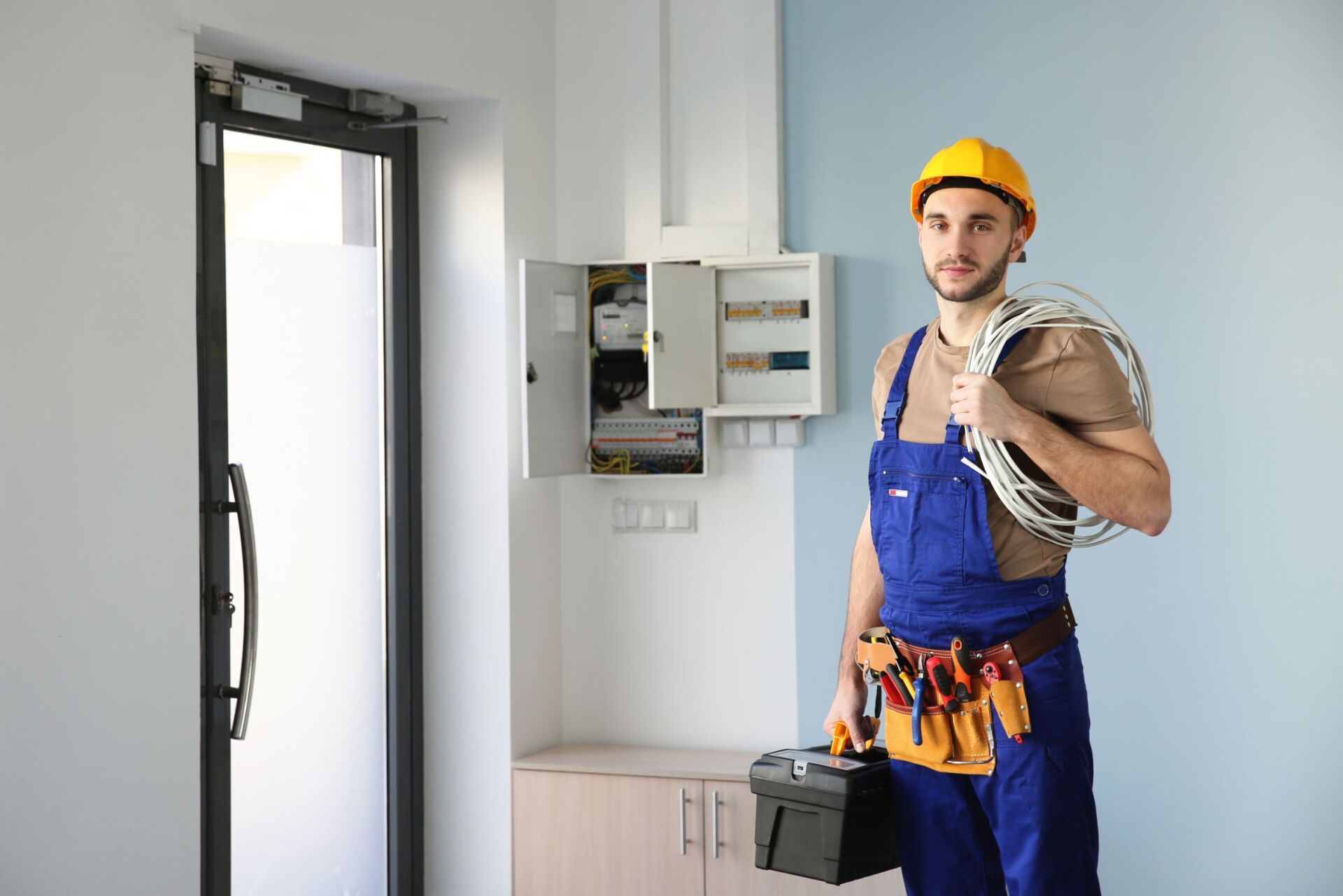 Electrician With Wires — Residential Electrician in Gympie, QLD