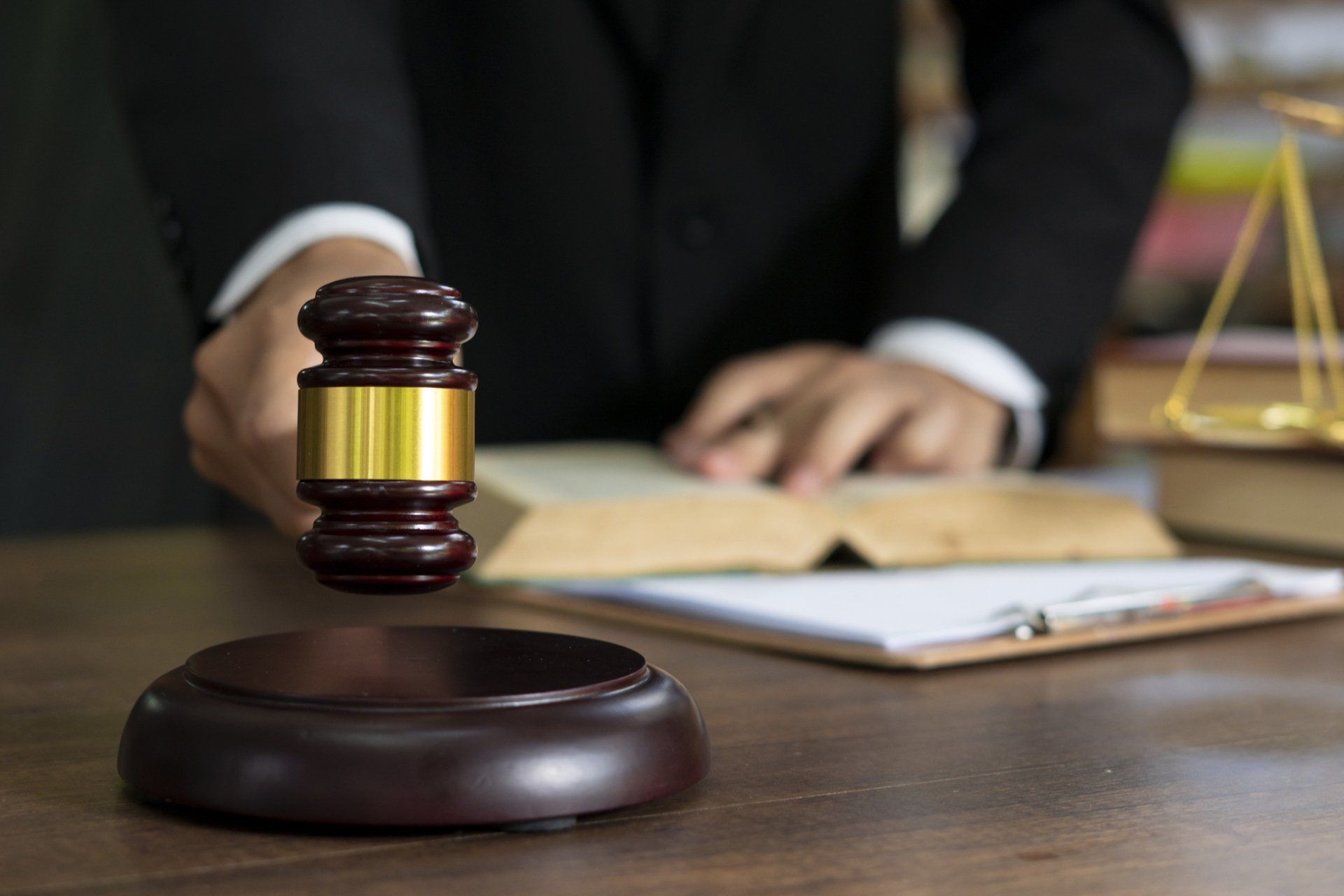 Man Reading Lawbook - Richmond, VA - Baronian & Associates, P.C.