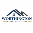 Logo for Vanguard Construction: Yellow house outline with tools, blue and yellow color scheme.