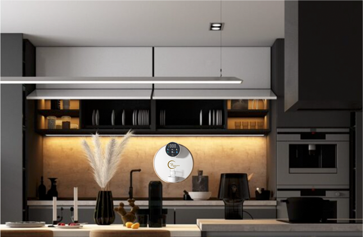 Modern kitchen with robot vacuum, cabinets, and built-in appliances; neutral tones.