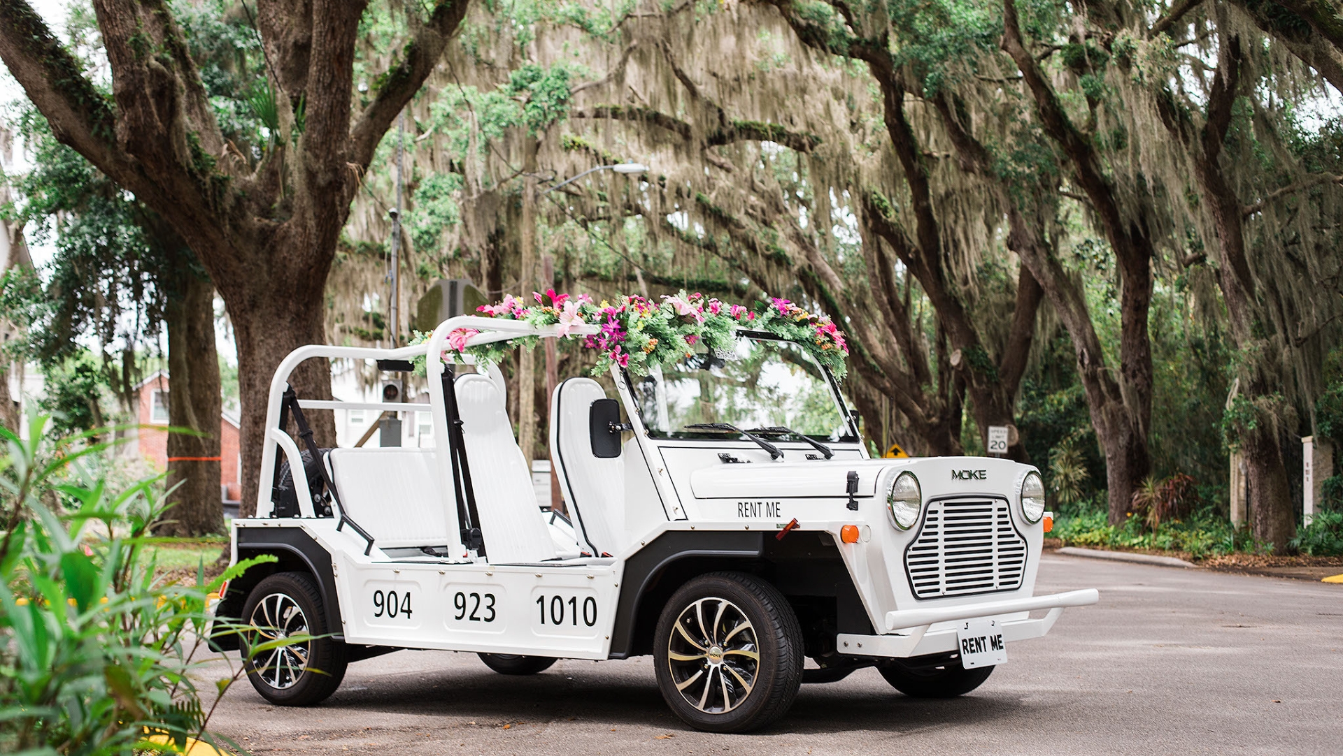 A white moke with flowers on the top on magnolia street in historic saint augustine florida