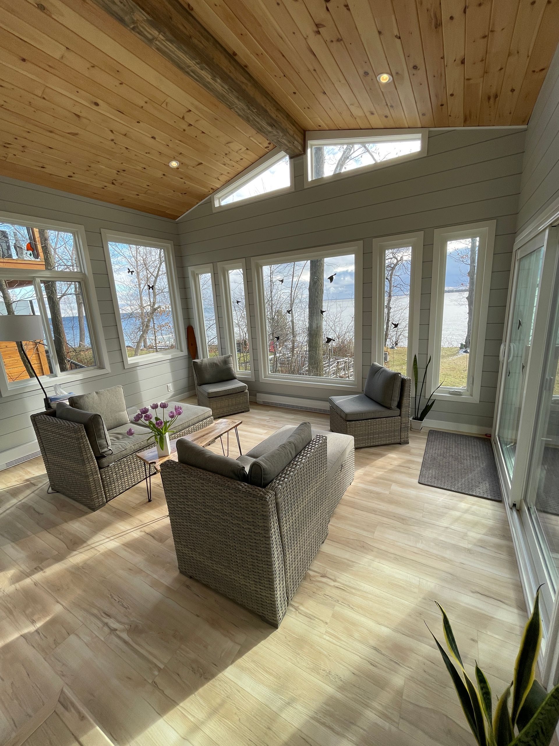 custom sunroom addition on the lake