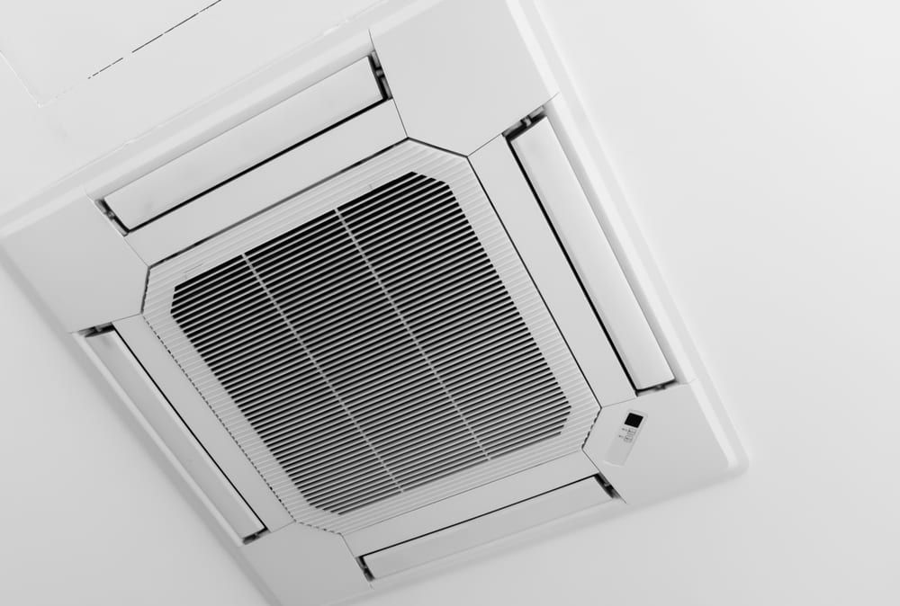 A Black and White Photo of A Ceiling Mounted Air Conditioner — Danzair Refrigeration & Airconditioning in South Lismore, NSW