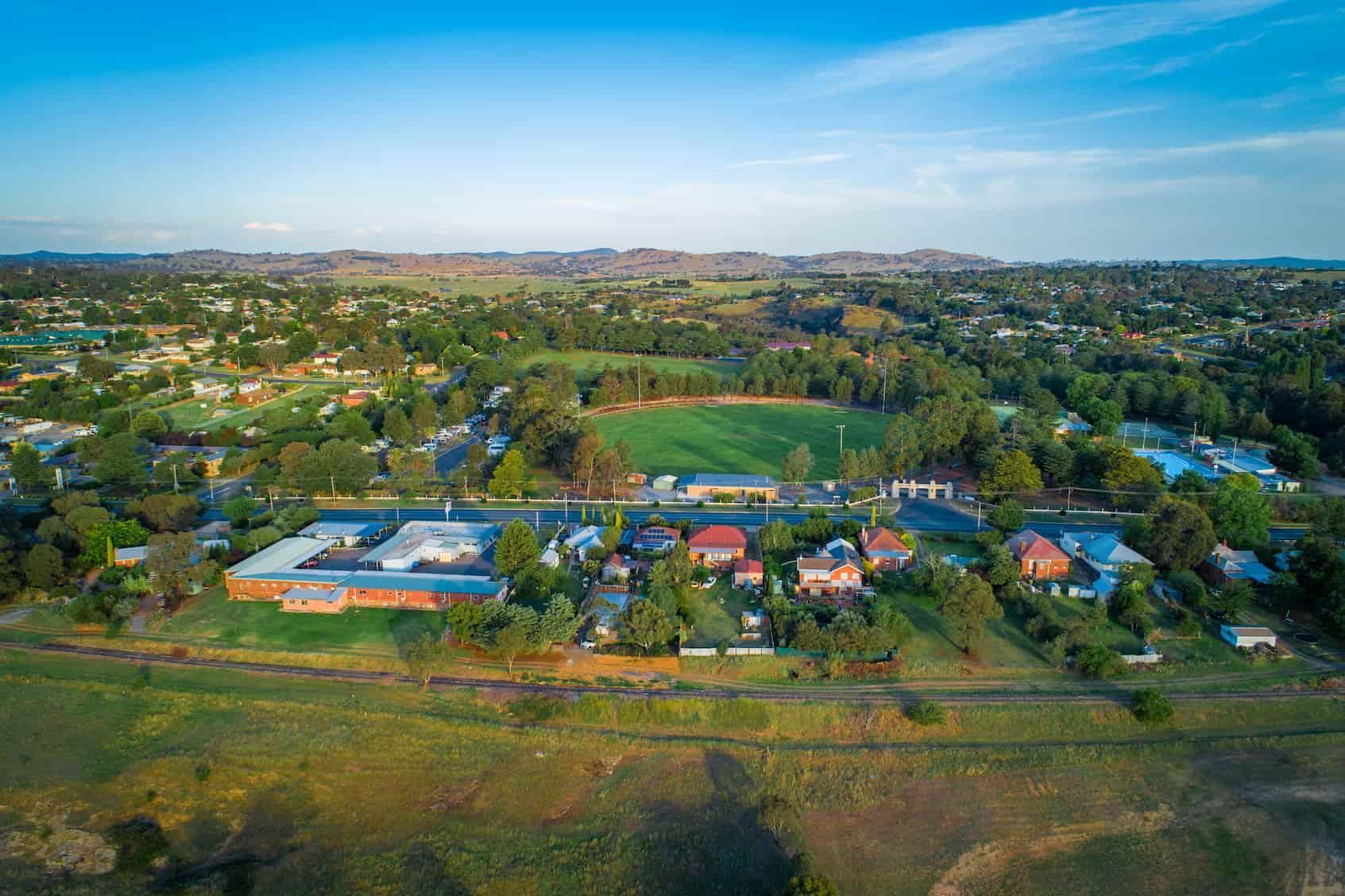 An Aerial View of A Small Town with A Field in The Middle of It — Danzair Refrigeration & Airconditioning in Alstonville, NSW