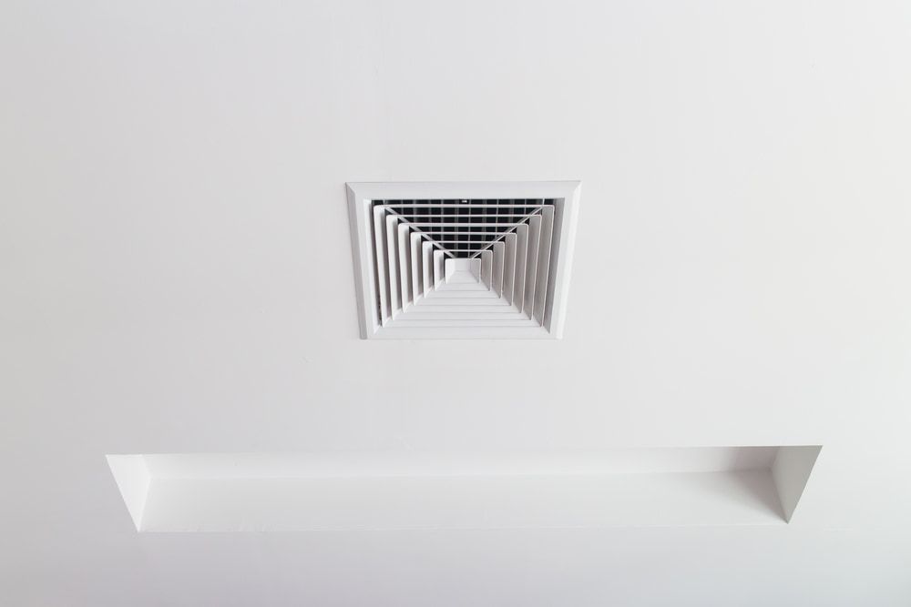 A Square Air Vent on A White Ceiling in A Room — Danzair Refrigeration & Airconditioning in South Lismore, NSW