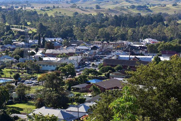 An Aerial View of A Small Town Surrounded by Trees and Houses — Danzair Refrigeration & Airconditioning in Kyogle, NSW