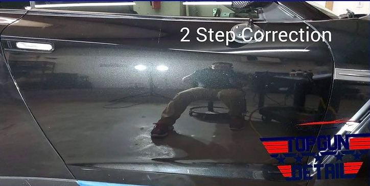 Black car door reflecting a person detailing it. Text overlay: