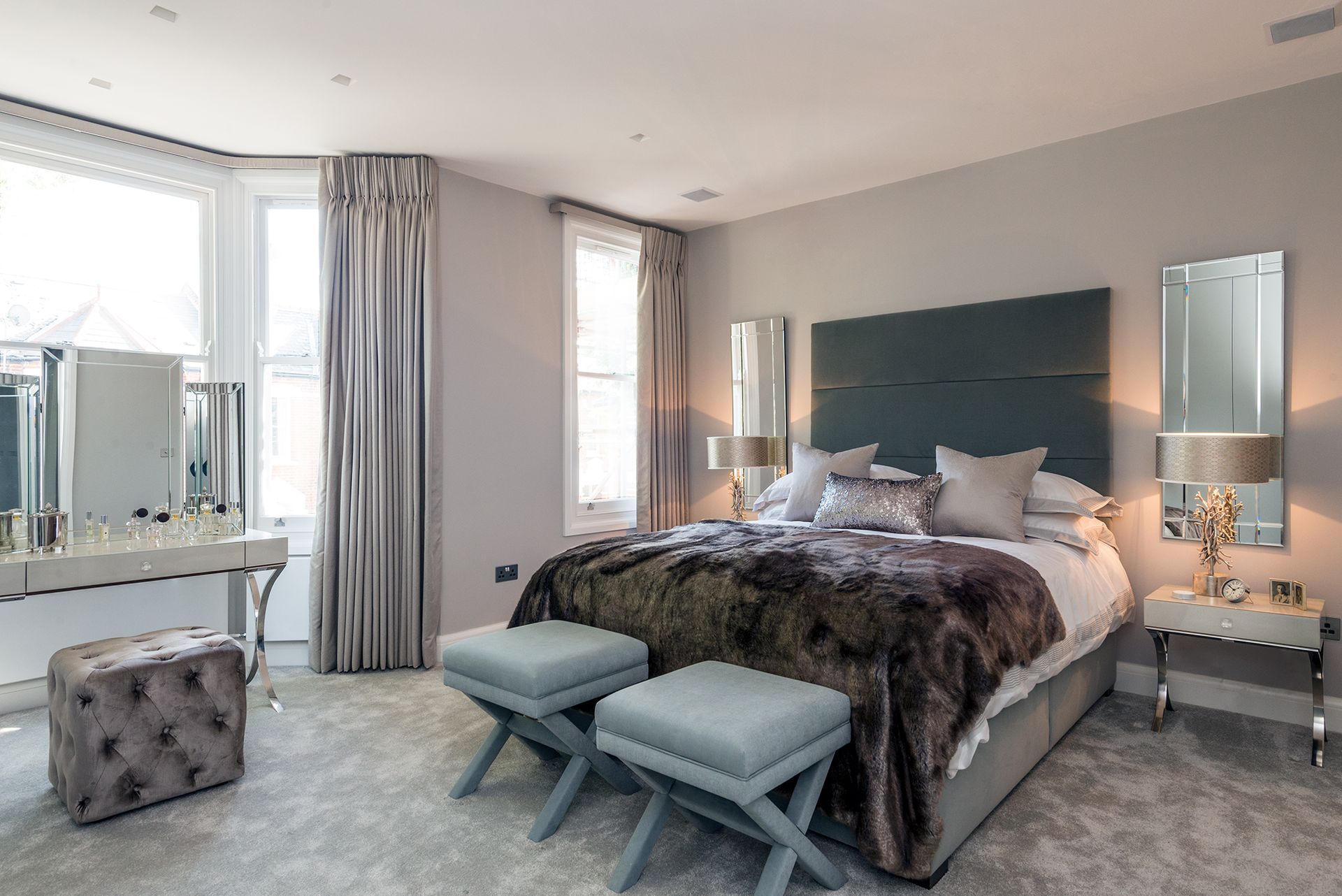 there is a large bed in the middle of the room 