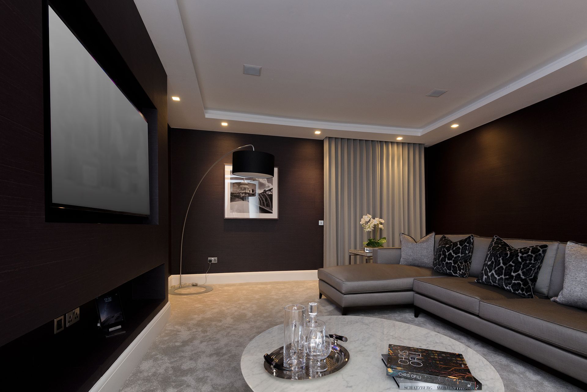 a living room with a couch and a flat screen tv