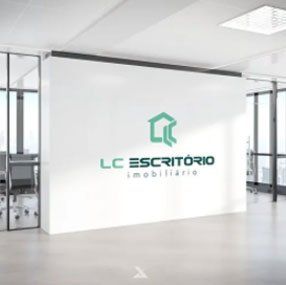 Uma parede branca com lc escritorio escrito nela