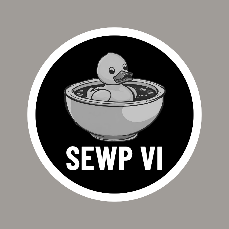 A rubber duck in a bowl on a black background, text “SEWP VI”.