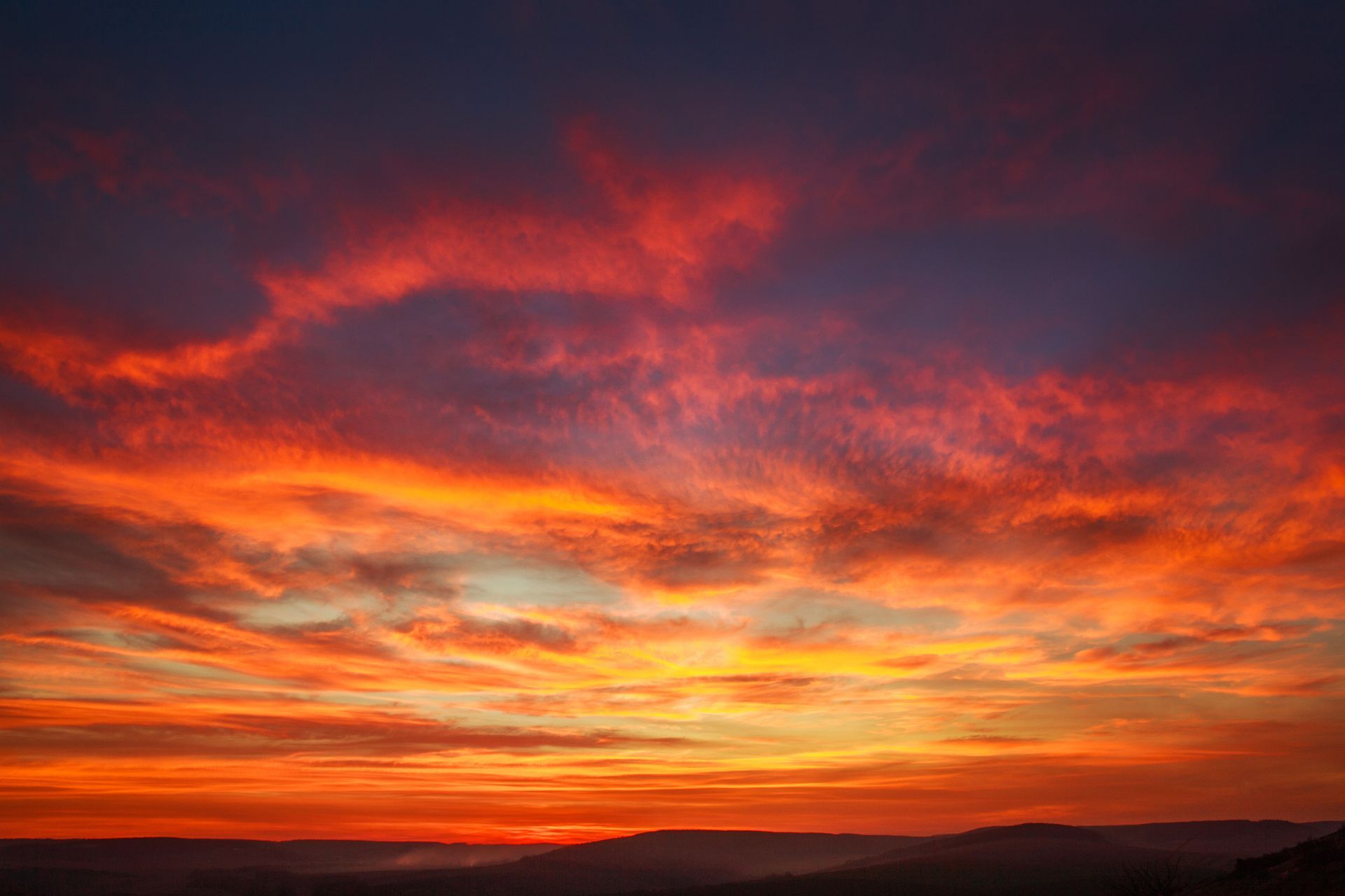 A sunset with a lot of clouds in the sky