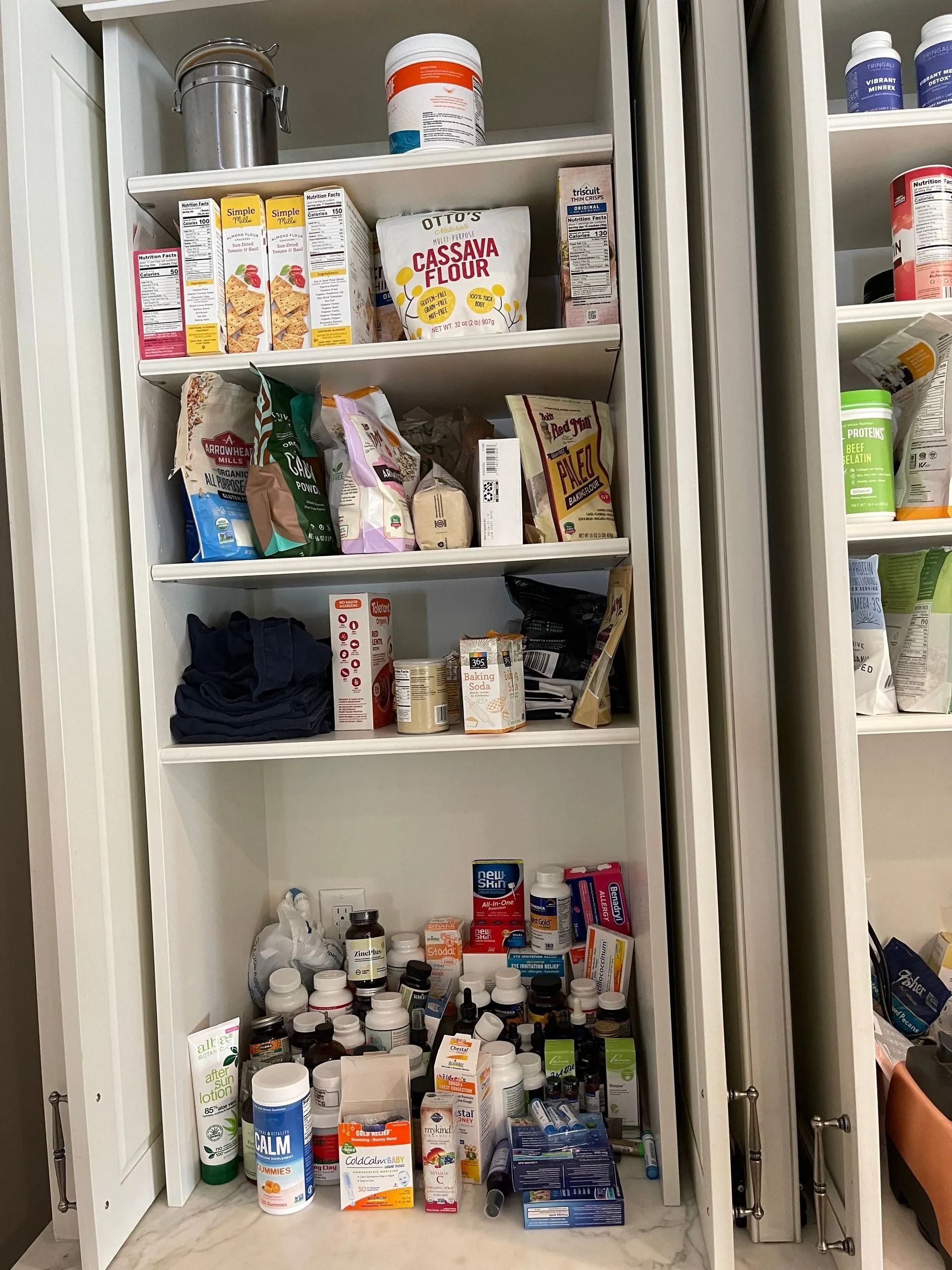 A pantry filled with lots of food and medicine.