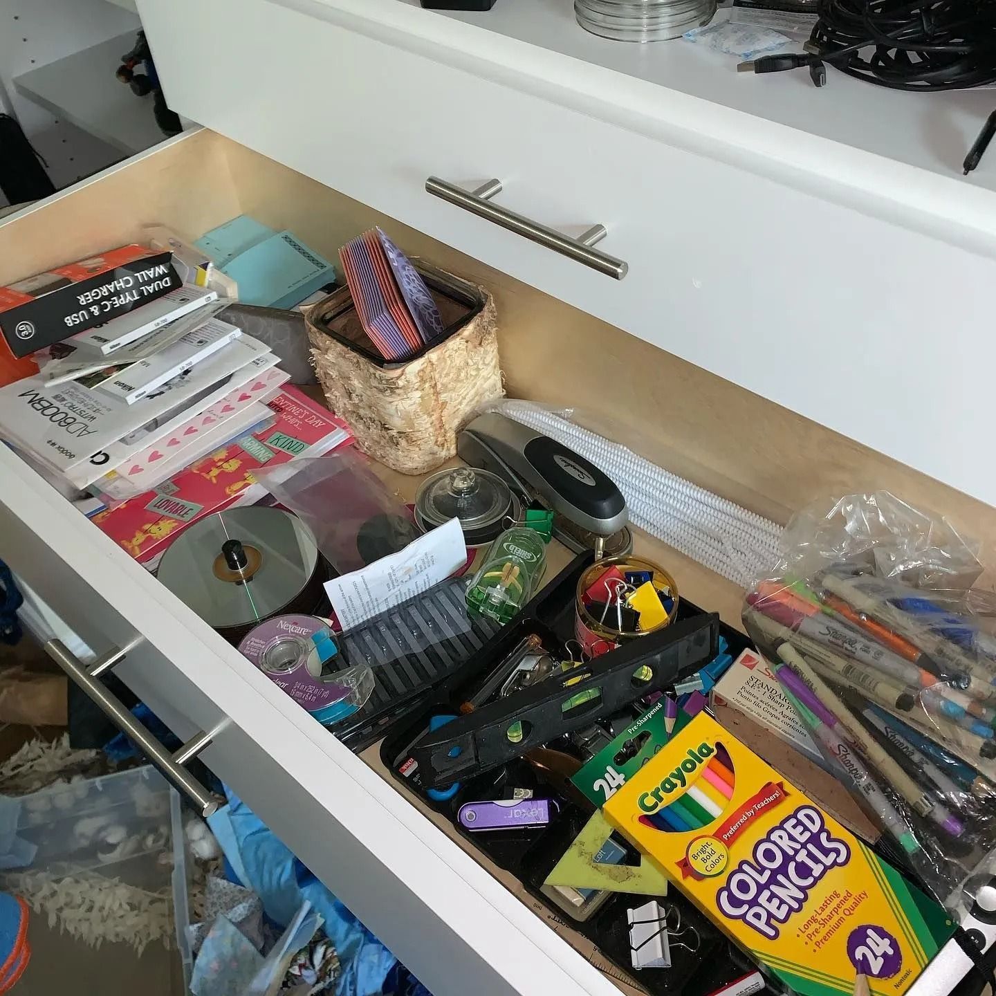 A drawer filled with crayola colored pencils