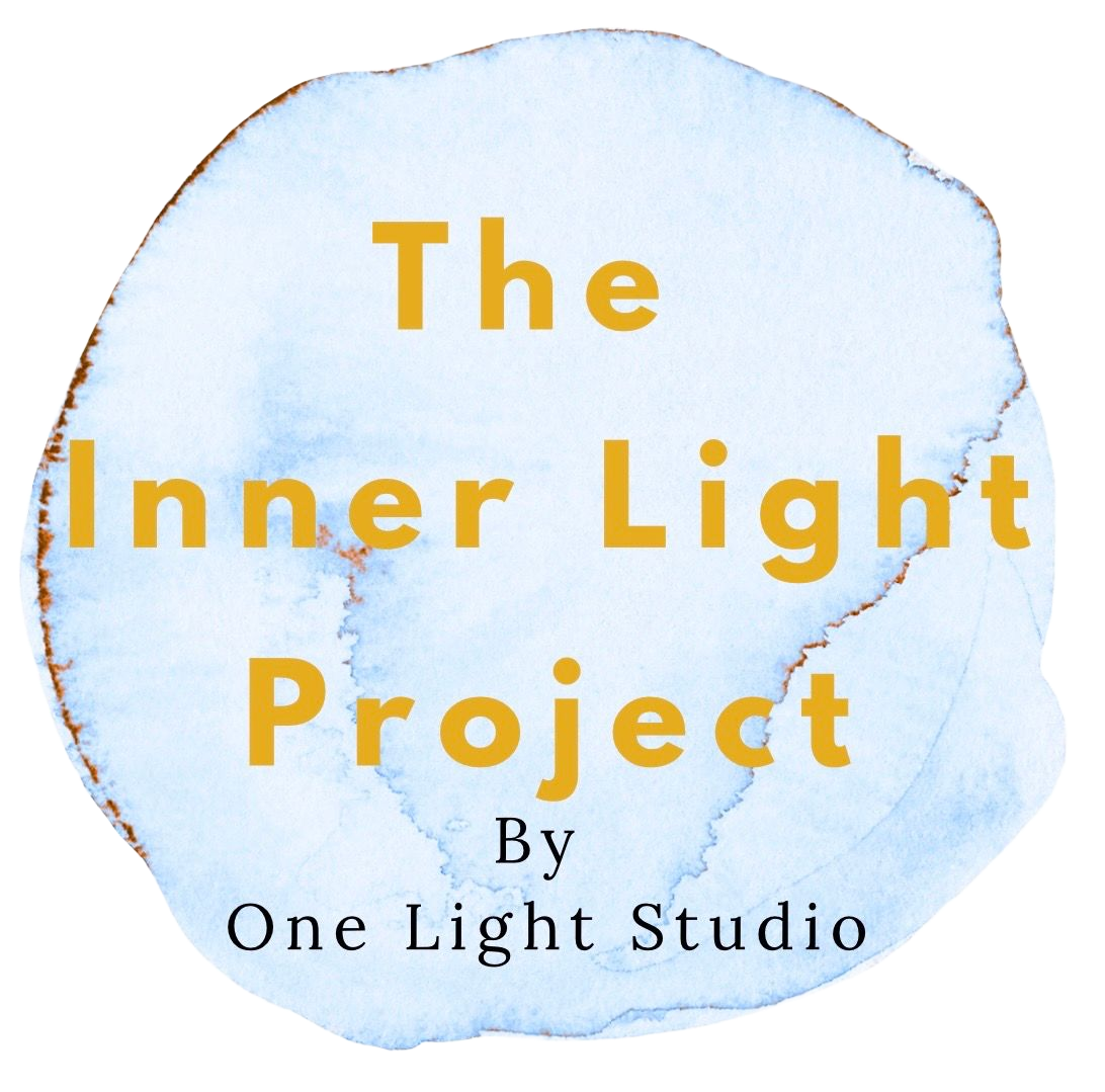Logo with pale blue watercolor circle and gold text: “The Inner Light Project” by One Light Studio