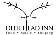 A black and white logo for a restaurant called deer head inn near adventure sports