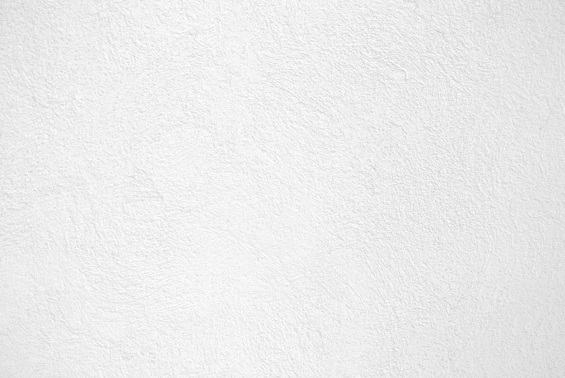 A close up of a white paper texture.