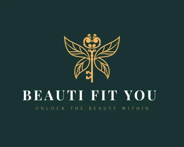 Logo on a gold key with butterfly-wing over the dark green text 