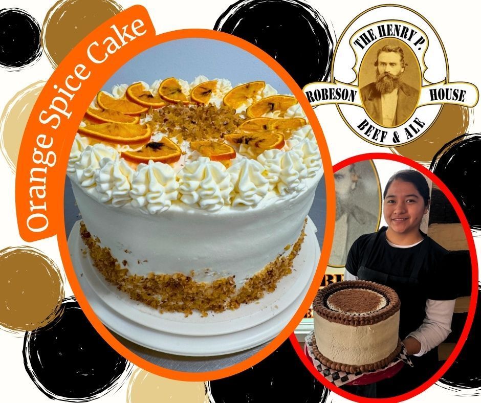 Orange spice cake with white frosting, orange slices, and a baker holding a decorated cake inset.