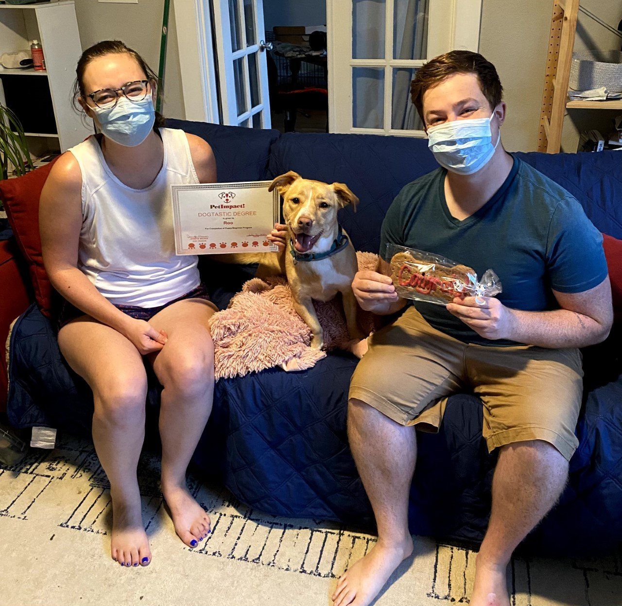 Dog Roo With Its Owner Couple — St. Louis, MO — PetImpact!